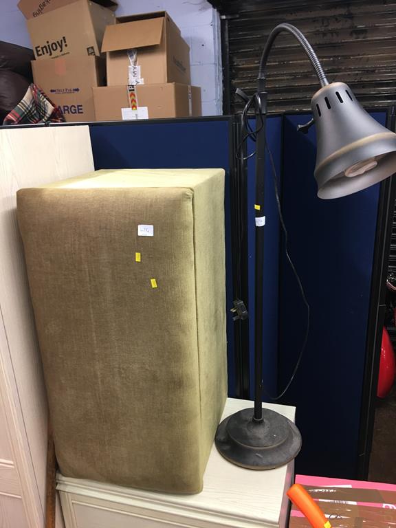 An Ottoman and a lamp