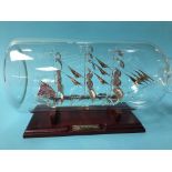A large glass ship in a bottle