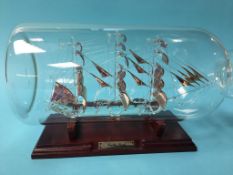 A large glass ship in a bottle