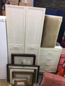A double door wardrobe and matching chest of drawers