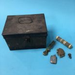A tin box containing a set of sovereign scales and a silver vesta etc.