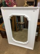 A white painted mirror