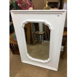 A white painted mirror