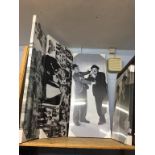 A quantity of Laurel and Hardy pictures and posters