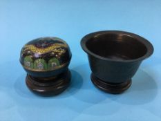 A small bronze Chinese bowl and a Cloisonne box and cover (2), 10.5cm diameter and 8cm diameter