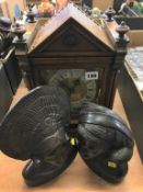 A walnut mantle clock and pair of busts