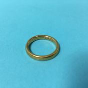 A 22ct gold wedding ring, size N/O, 6.2g