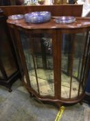 A walnut china cabinet