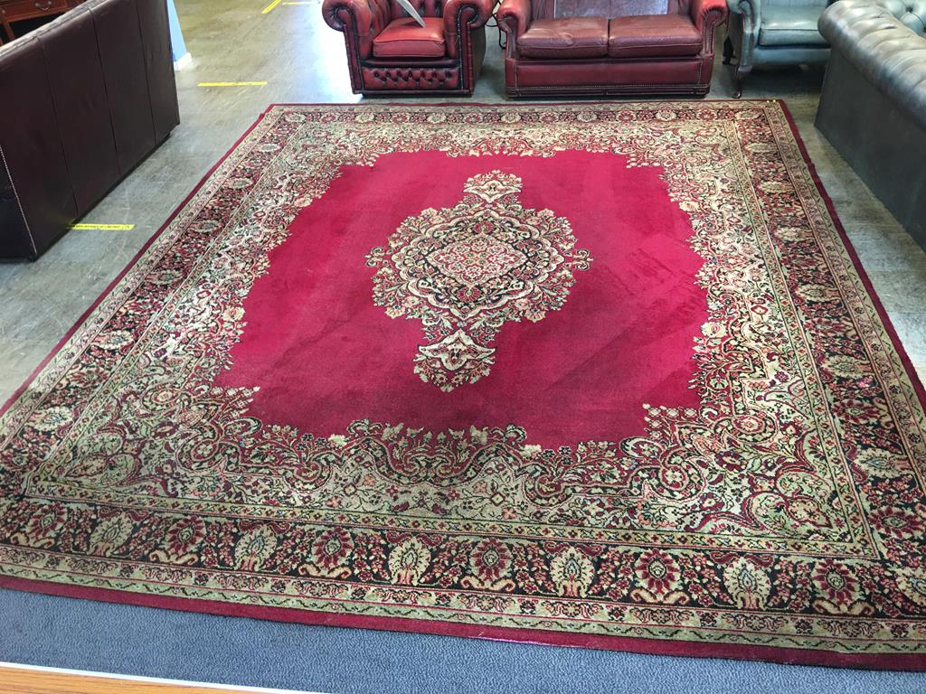 A large patterned carpet square