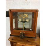 A set of mahogany cased chemist scales