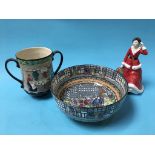 A Royal Doulton series ware bowl, D3858, a Doulton 'Pottery in the Past' jug and a figure