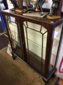 An oak china cabinet