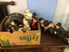 A quantity of Stan Laurel and Oliver Hardy figures