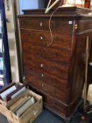 A Continental straight front chest of seven drawers, supported on scrolling feet, 102cm wide