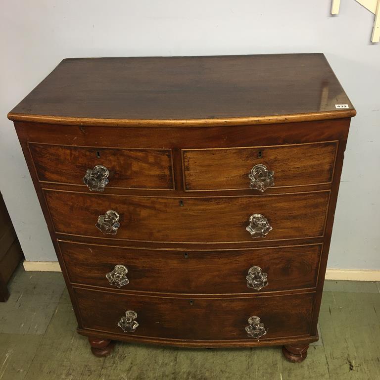 A 19th century mahogany bow front chest of drawers, with two short and three long drawers
