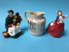 A Royal Doulton 'Sea Shanty' water jug, a Doulton 'The Balloon Seller' and 'Autumn Breezes' (3)