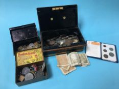 A collection of various coins and notes and commemorative medals etc.
