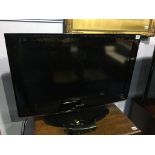 A Samsung colour TV (with remote)