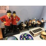 Four Stan Laurel and Oliver Hardy figures