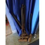 Four croquet mallets