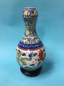 A 20th century Chinese Wucai garlic shaped vase, 34cm height