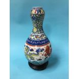 A 20th century Chinese Wucai garlic shaped vase, 34cm height