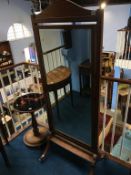 An Edwardian mahogany cheval mirror, with satinwood cross banding