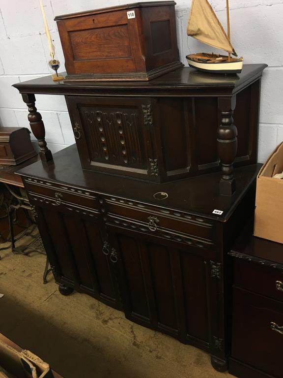 An oak court cupboard