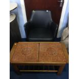 A swivel office chair and a teak tile top coffee table.