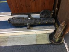 A cast iron cannon, stamped G. and G. NS, 95cm length