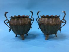 A pair of Middle Eastern decorative brass vases, 17cm height