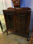 An oak china cabinet