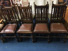 A set of four oak barley twist chairs