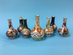 Seven various Derby vases