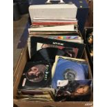 Assorted records and a record player, to include The Jam, The Beatles etc.