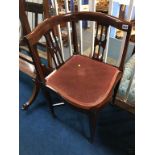 An Edwardian mahogany corner chair