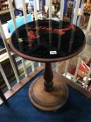An oak circular table with decorative glass top, 46cm diameter