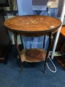 A late 19th century oval two tier etagere, with parquetry and marquetry top and metal mounts, 55cm