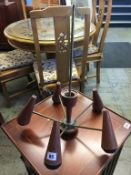 A 1970's teak and brass five branch chandelier