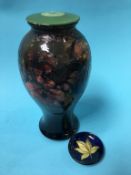 A Moorcroft vase and two very small dishes