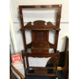 An Edwardian mahogany hall stand