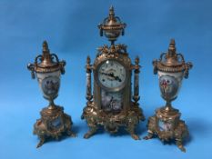 A decorative clock garniture