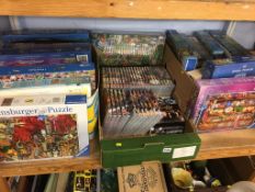 A shelf of Dr Who DVDs and jigsaws etc.