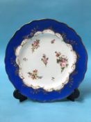 A 19th century decorative porcelain plate