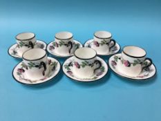 Six decorative Shelley coffee cans and saucers