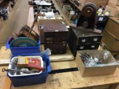 A selection of tins, rocks and miscellaneous items