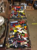 Two boxes of Dinky toys, cars and buses etc.