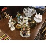 Six figurines, a teapot, a brass mantle clock and a glass bowl on stand