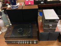 A Pure DAB digital radio and speaker, and a Panasonic turntable and speakers