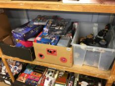 A shelf of assorted toys and games